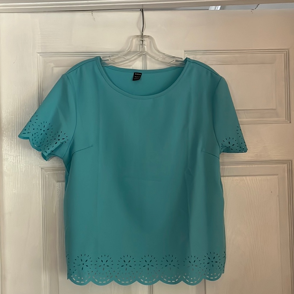 Top with cut out design in sleeves and bottom